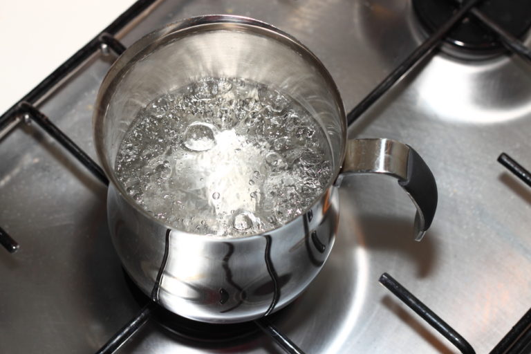 Boiling water on stove