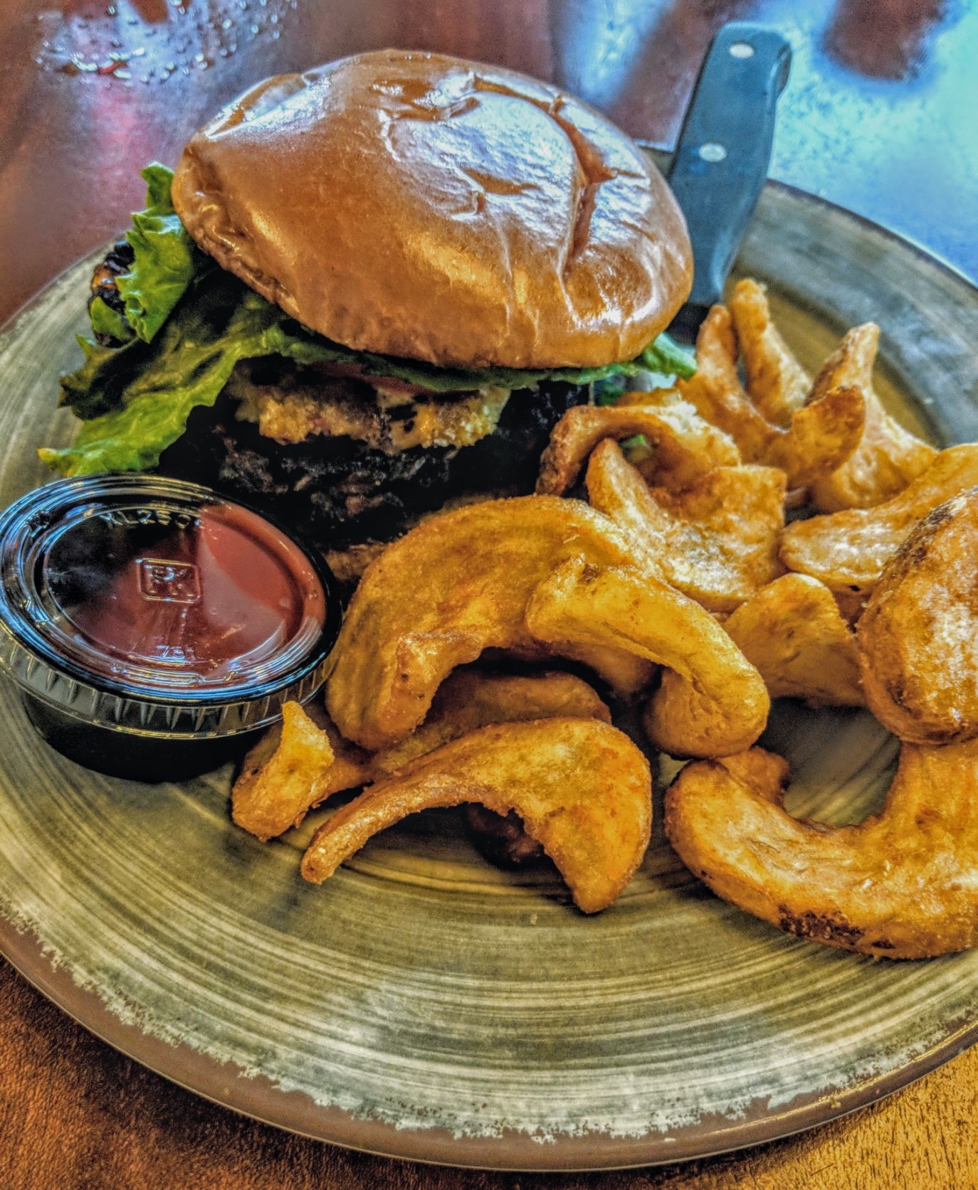 Cheeseburger and potato wedges at Ivy on the Square