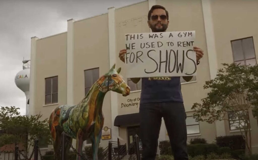 Jeremy McKinnon outside of the Discovery Center, a venue he played when it was a gym.